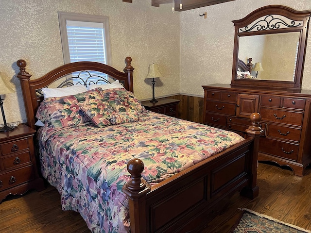 bedroom featuring dark hardwood / wood-style floors