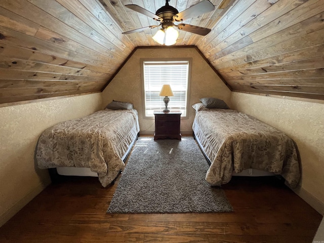 bedroom featuring lofted ceiling, dark hardwood / wood-style flooring, and wooden ceiling