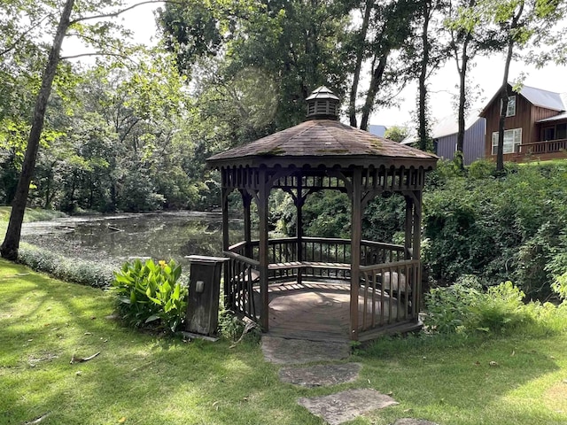 surrounding community with a gazebo and a lawn