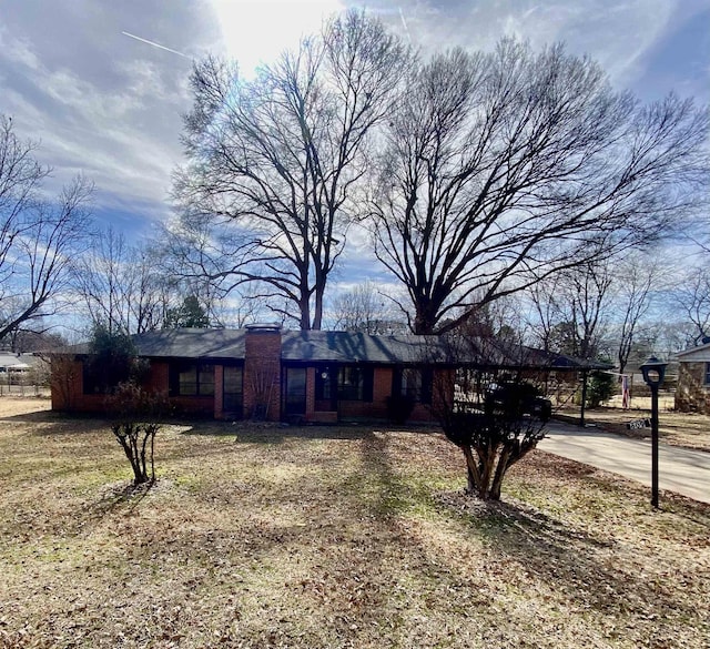 view of front of home featuring brick siding