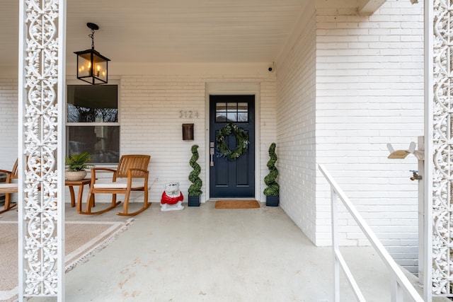 property entrance featuring covered porch