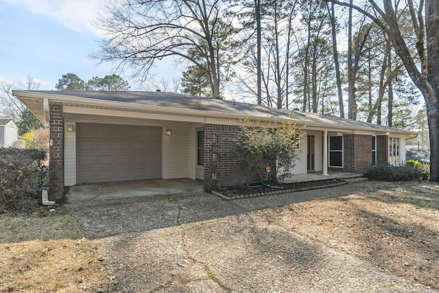 ranch-style home with a garage