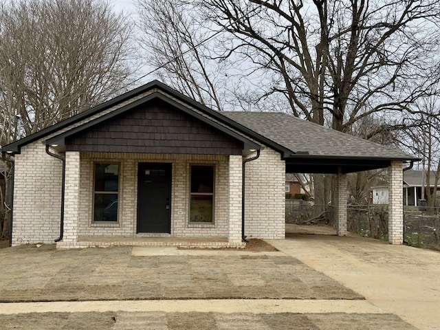 view of front facade featuring a carport