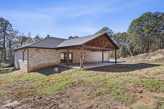 rear view of property with a patio
