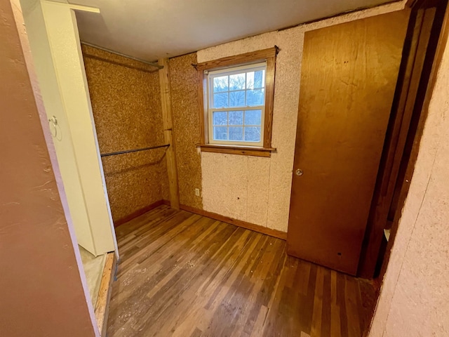 unfurnished bedroom featuring wood-type flooring