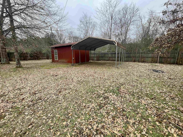 view of yard with a carport