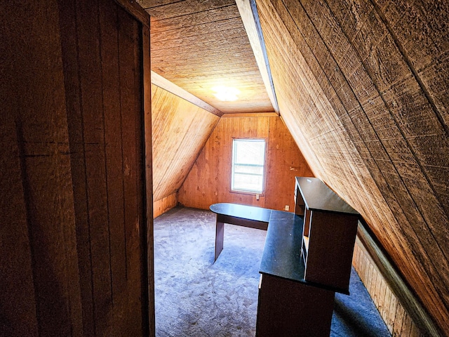868 River Bend Cv, El Dorado, AR 71730 - additional living space with dark carpet, wood ceiling, vaulted ceiling, and wooden walls