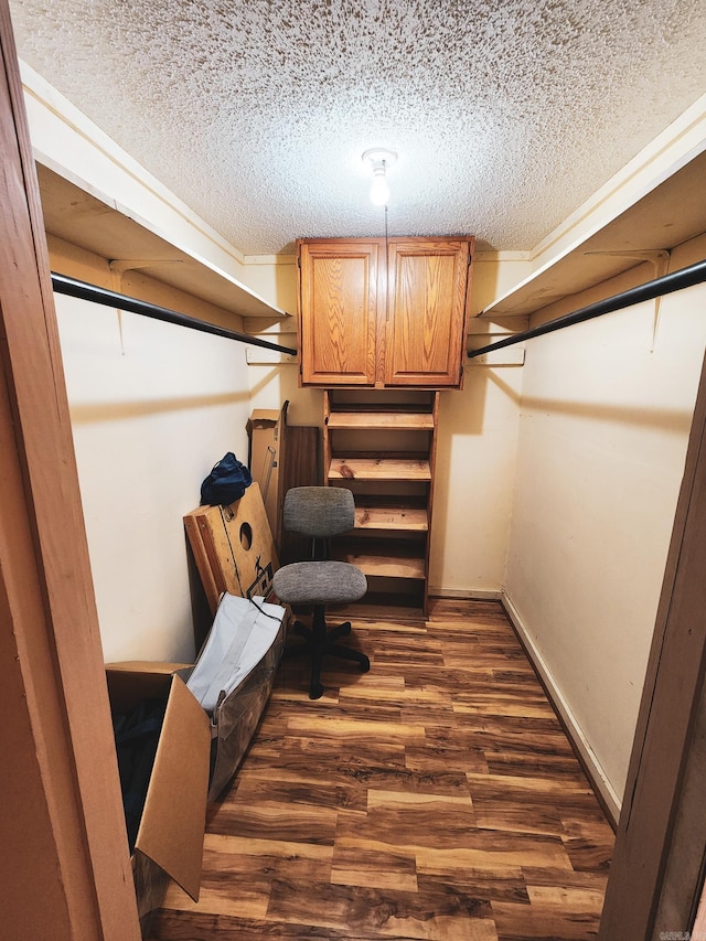 868 River Bend Cv, El Dorado, AR 71730 - spacious closet with dark wood-type flooring