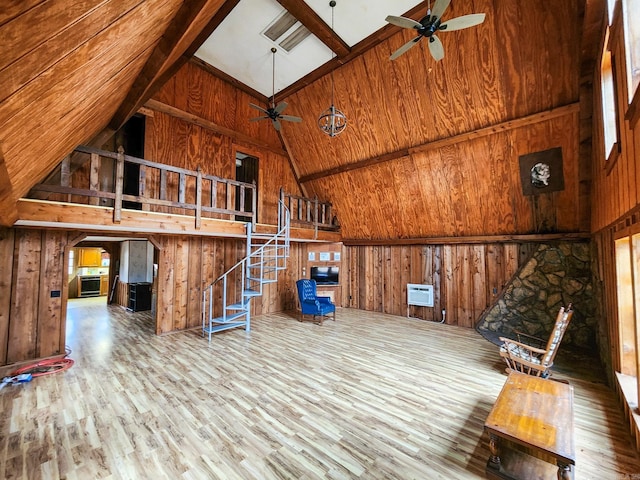868 River Bend Cv, El Dorado, AR 71730 - interior space featuring high vaulted ceiling and wood walls