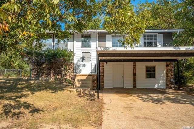 view of front of house featuring a carport