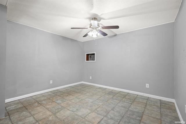 unfurnished room with ceiling fan