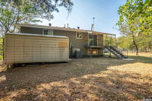 back of property with central AC unit