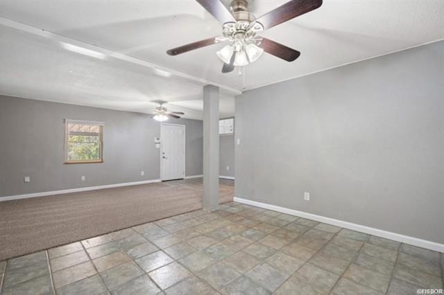 spare room with ceiling fan