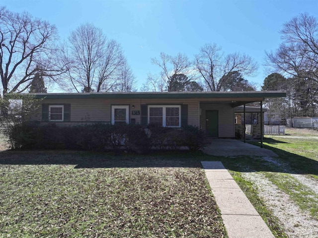 single story home with a carport