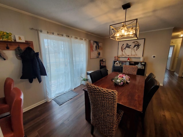 dining space featuring crown molding, a chandelier, and dark wood-type flooring