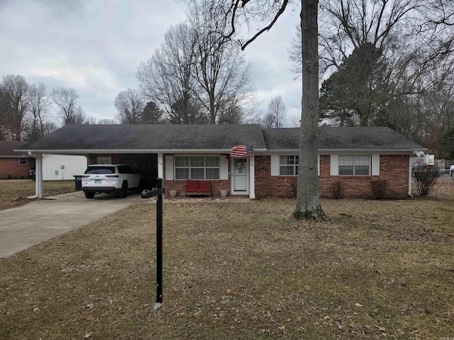 single story home featuring a carport and a front lawn