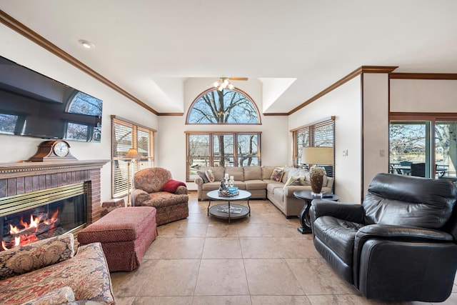 living room featuring crown molding, light tile patterned flooring, a brick fireplace, and a wealth of natural light