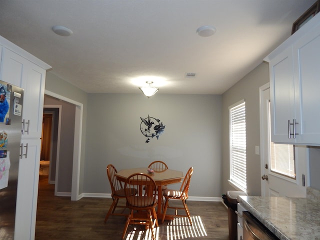 dining room featuring dark wood-type flooring