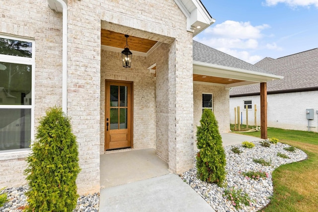 entrance to property featuring a patio area