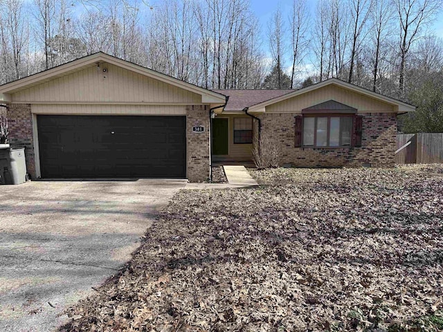 ranch-style home with a garage