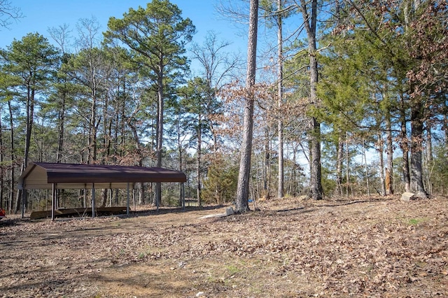 view of yard featuring a carport