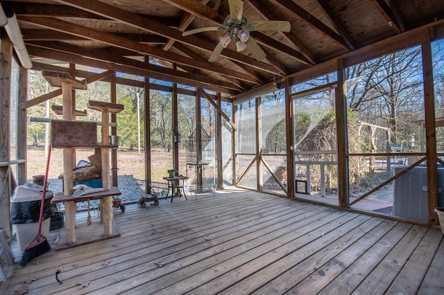 unfurnished sunroom with vaulted ceiling and ceiling fan