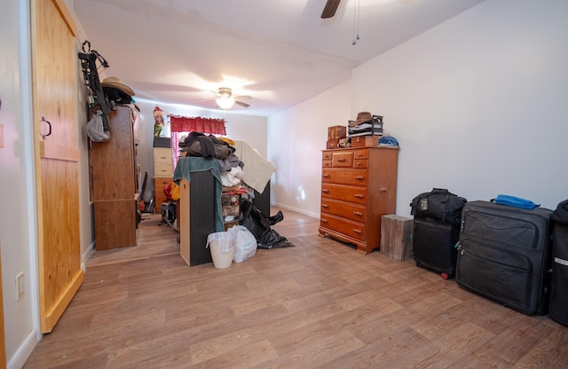 interior space featuring ceiling fan