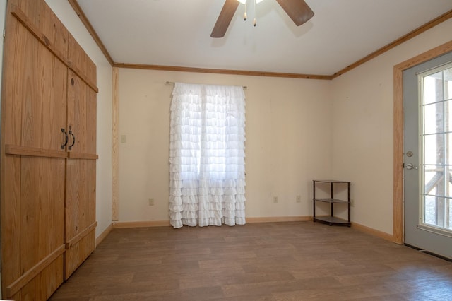 unfurnished room featuring crown molding, ceiling fan, and wood-type flooring