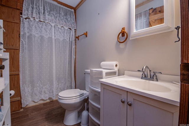 bathroom with vanity, wood-type flooring, toilet, and a shower with shower curtain