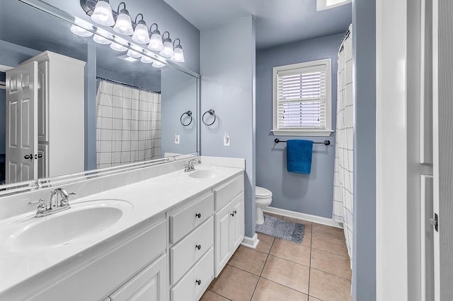 bathroom featuring tile patterned flooring, vanity, a shower with curtain, and toilet