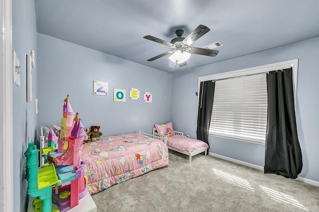 carpeted bedroom with ceiling fan