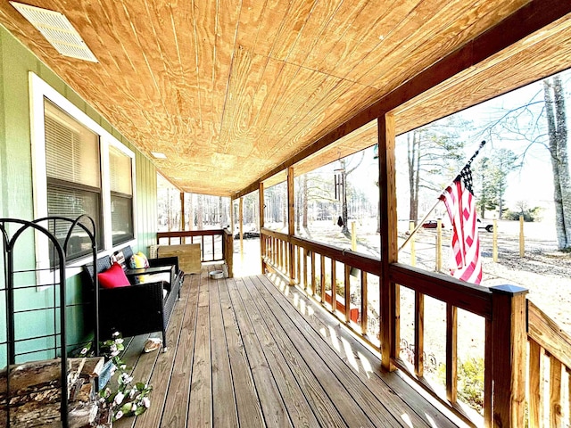 view of snow covered deck