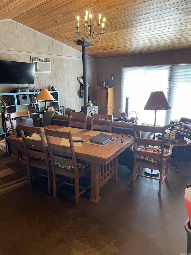 dining room featuring an AC wall unit, a wood stove, vaulted ceiling, wooden ceiling, and a chandelier