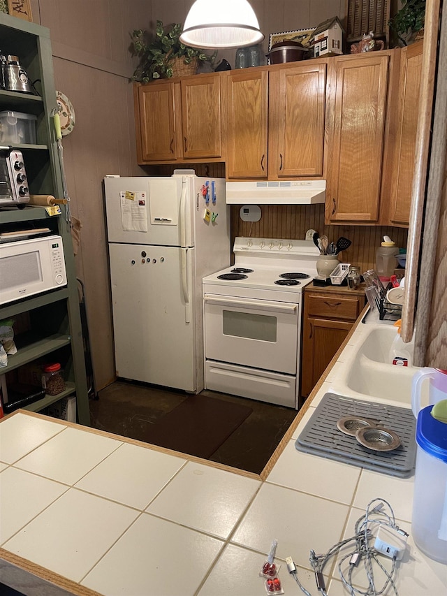 kitchen featuring white appliances