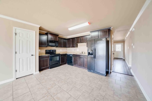 kitchen featuring sink, crown molding, dark brown cabinets, and black appliances