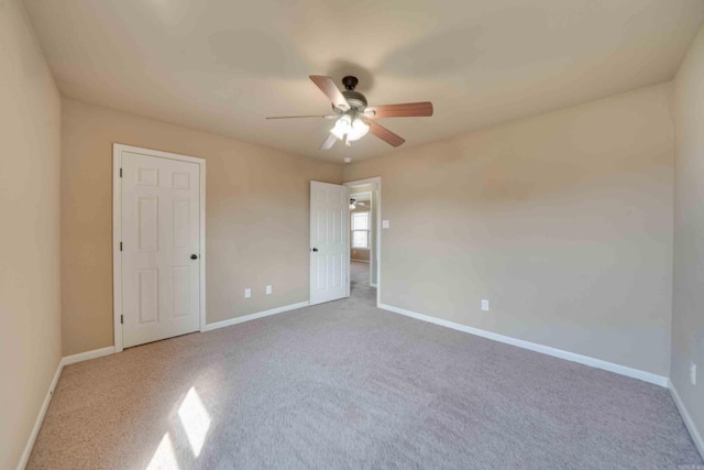 unfurnished bedroom featuring ceiling fan