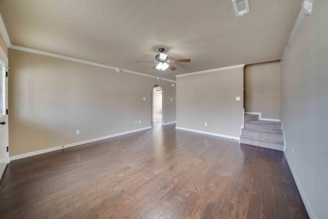 unfurnished living room featuring crown molding, dark hardwood / wood-style floors, and ceiling fan