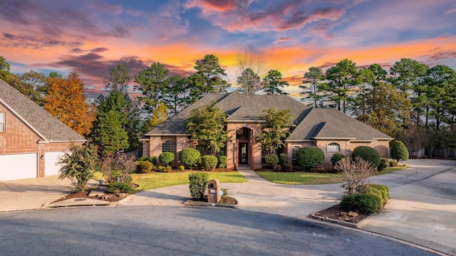 view of front of property featuring a garage