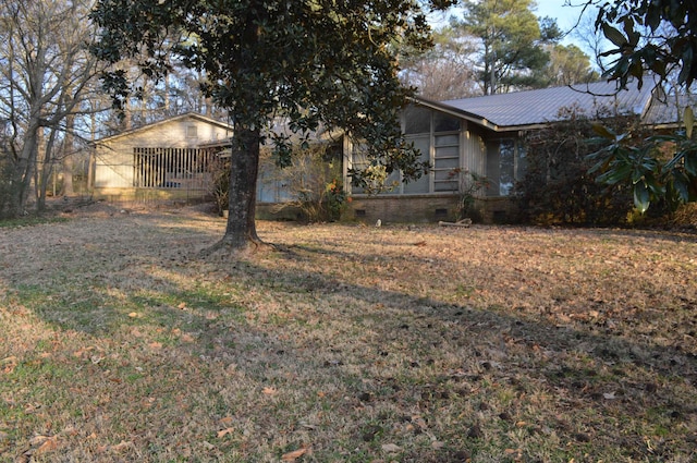 exterior space with a front lawn