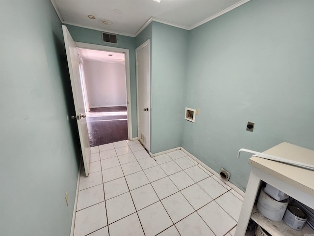 laundry area featuring light tile patterned flooring, washer hookup, crown molding, and electric dryer hookup