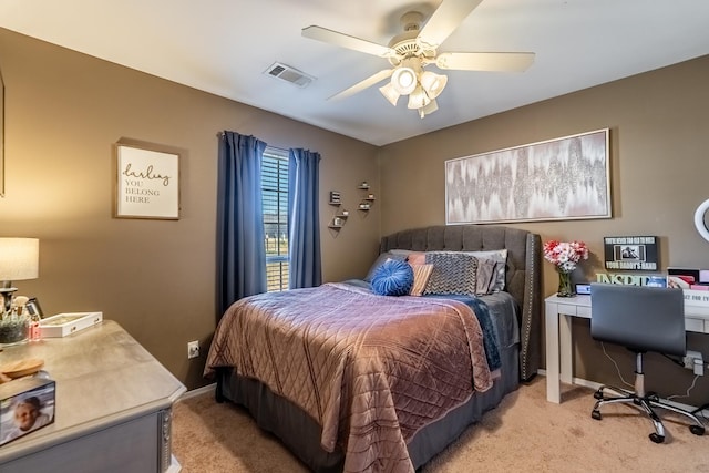 bedroom with light carpet and ceiling fan