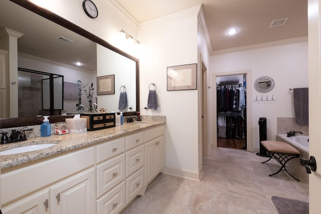 bathroom featuring ornamental molding, vanity, and independent shower and bath