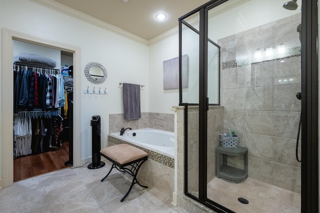 bathroom featuring separate shower and tub, tile patterned flooring, and crown molding