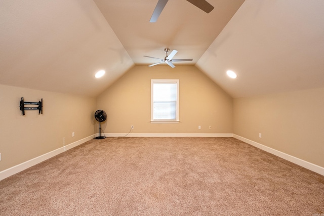 bonus room featuring ceiling fan, carpet flooring, and lofted ceiling