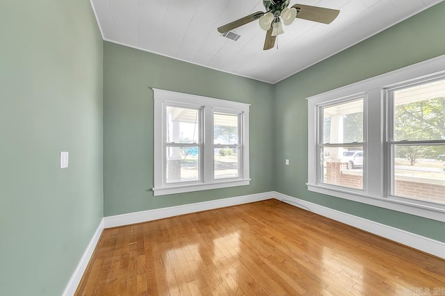 unfurnished room featuring ceiling fan and light hardwood / wood-style flooring