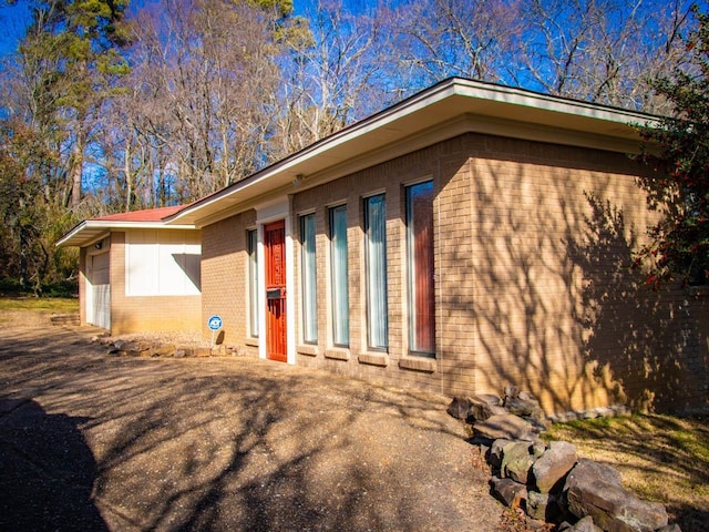 view of home's exterior featuring a garage