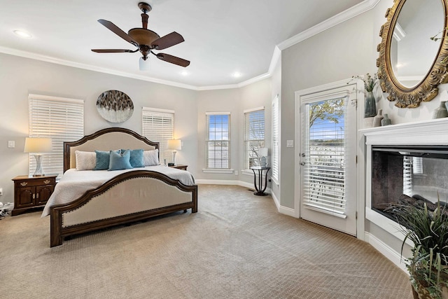 carpeted bedroom with a multi sided fireplace, crown molding, access to outside, and ceiling fan