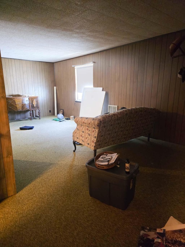 living area featuring carpet floors