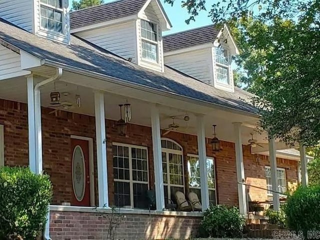 property entrance with covered porch