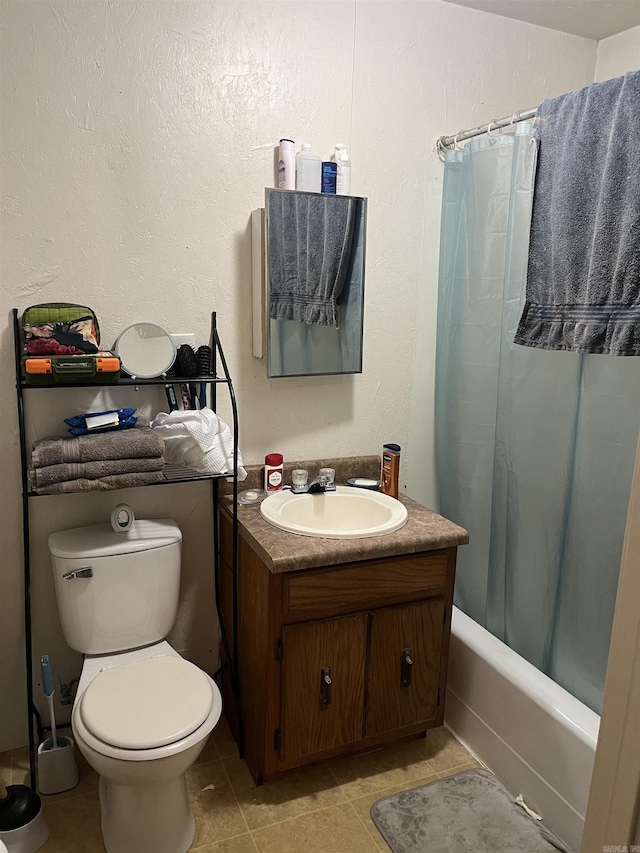 full bathroom featuring vanity, shower / tub combo with curtain, toilet, and tile patterned flooring